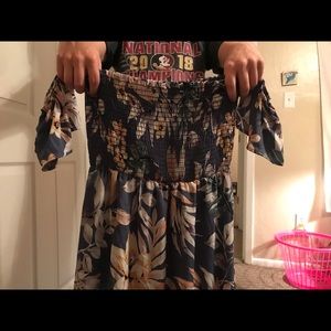 floral off the shoulder ruffle dress .